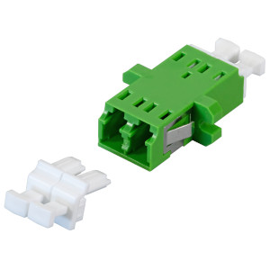 Green fiber optic adapter with angle polishing and removed white protective cap.